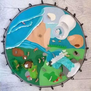 Teatro de la naturaleza en un tapiz, tapete, alfombra o manta de suelo